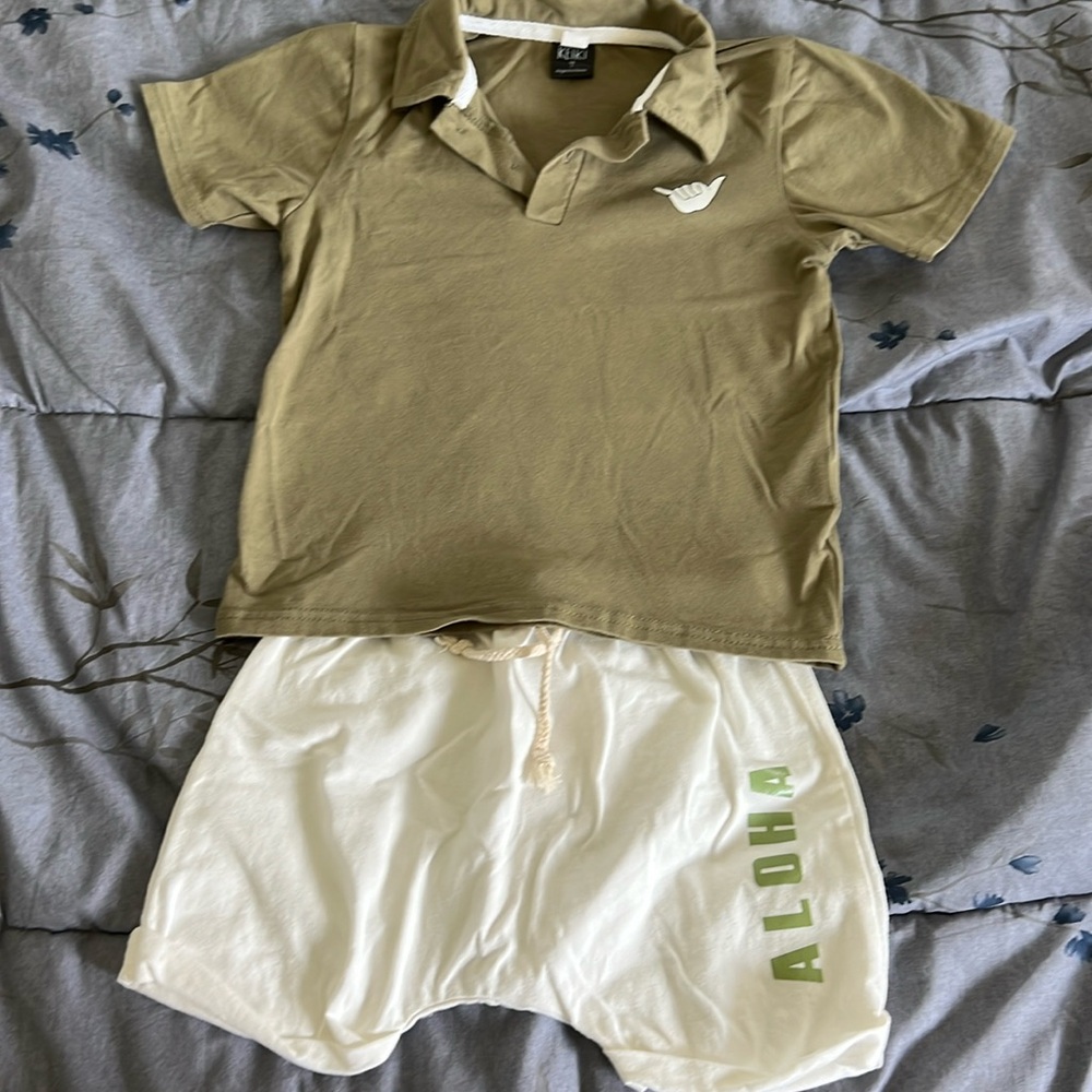Modern Keiki boutique set. Green collared shirt with cream shorts.